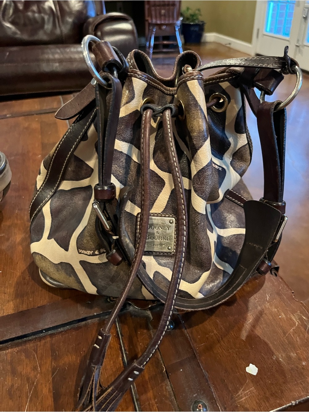 Dooney & Bourke Brown and Cream Giraffe-Print Drawstring Bucket Bag